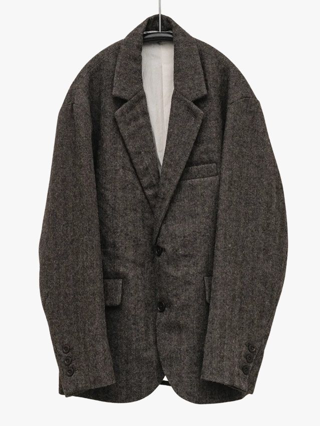 Image may contain: Blazer, Clothing, Coat, Jacket, Formal Wear, and Suit