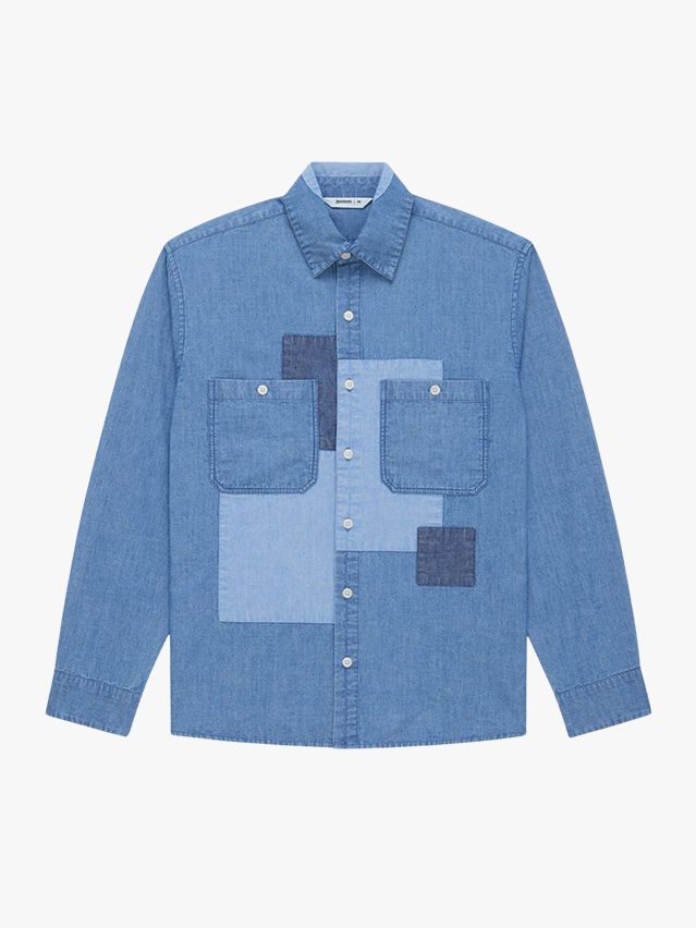 Image may contain: Clothing, Pants, Shirt, Jeans, Long Sleeve, Sleeve, and Coat