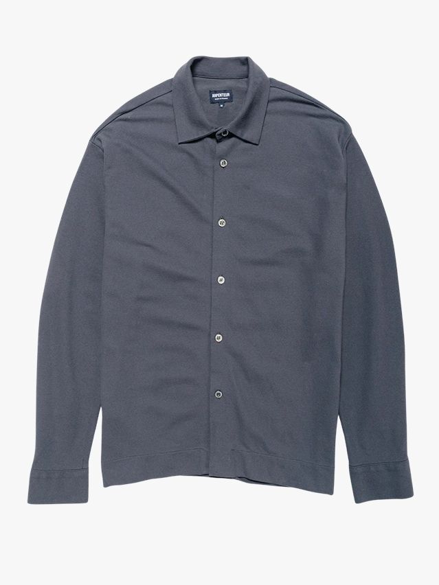 Image may contain Clothing Long Sleeve Sleeve Shirt Pants and Coat