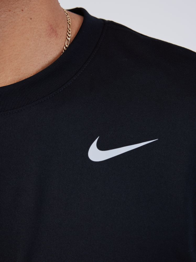 Image may contain: Clothing, T-Shirt, Long Sleeve, Sleeve, Adult, Person, Accessories, Jewelry, and Necklace