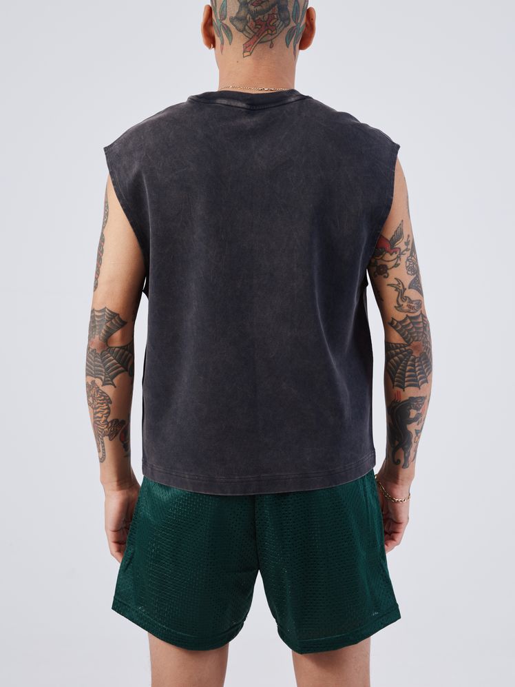 Image may contain: Clothing, Shorts, Back, Body Part, Person, T-Shirt, Sleeve, Adult, Accessories, Bracelet, and Jewelry