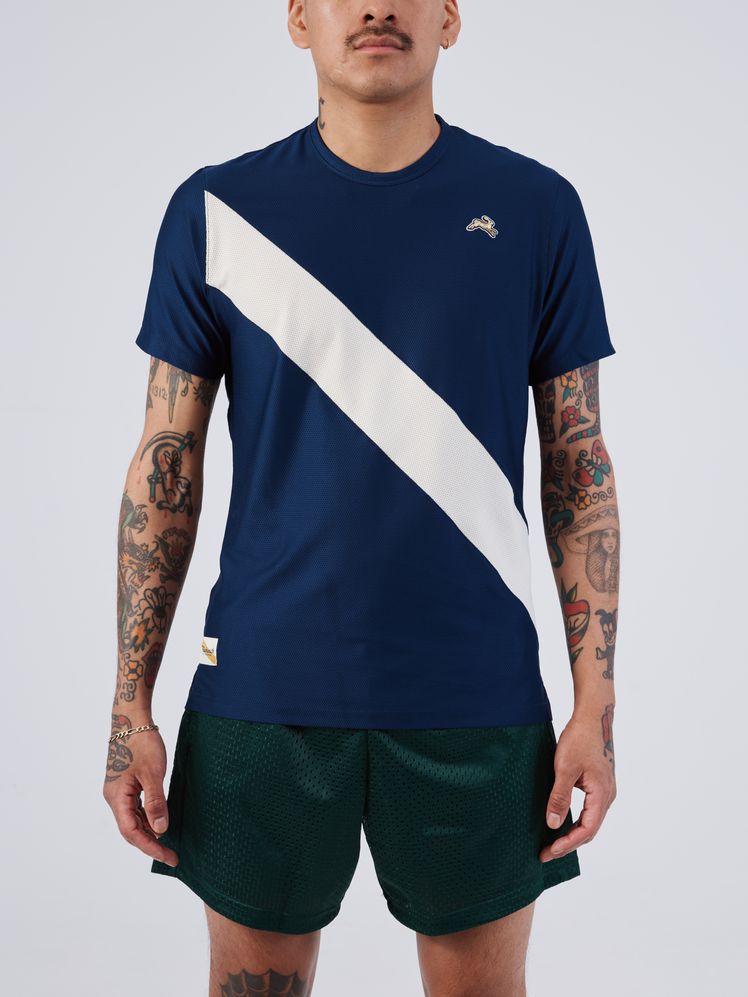 Image may contain: Clothing, T-Shirt, Sleeve, Long Sleeve, Shorts, Shirt, Adult, and Person