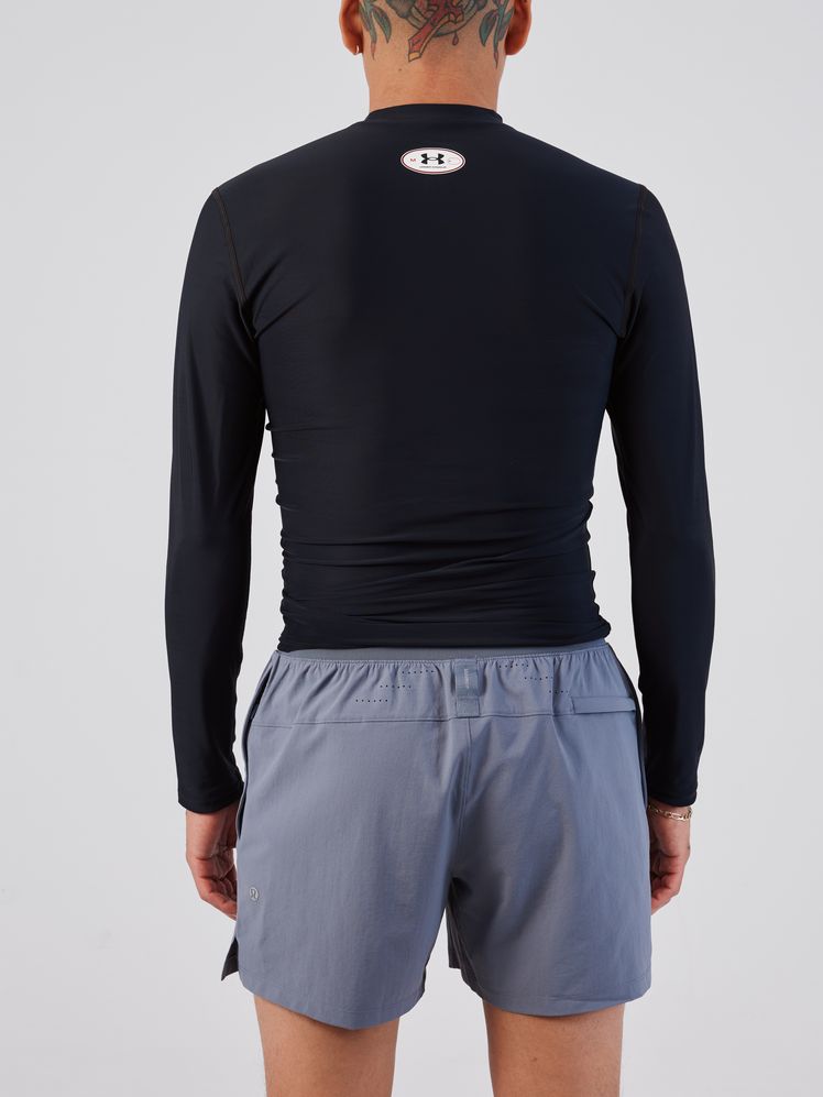 Image may contain: Clothing, Long Sleeve, Sleeve, Shorts, Adult, and Person