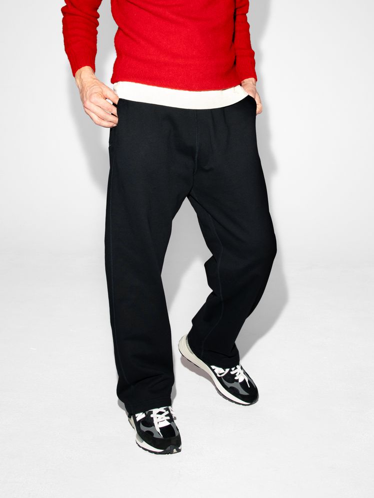 Image may contain: Clothing, Pants, Footwear, Shoe, Person, Teen, and Sneaker