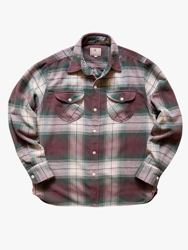 Image may contain Clothing Shirt Dress Shirt Long Sleeve Sleeve and Blouse