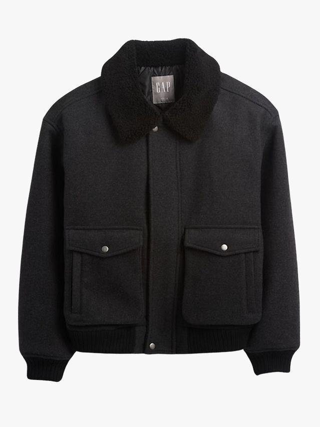 Image may contain: Clothing, Coat, Jacket, Fleece, Knitwear, and Sweater