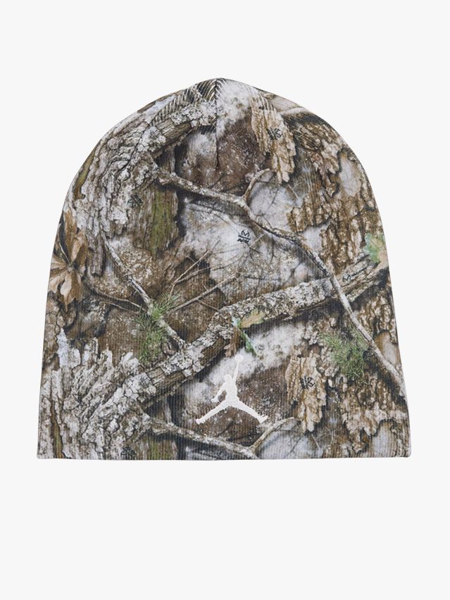 Image may contain: Cap, Clothing, Hat, Swimwear, Plant, and Tree