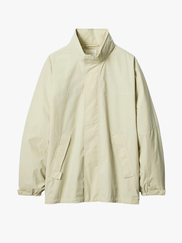 Image may contain Clothing Coat Jacket Long Sleeve Sleeve and Blouse