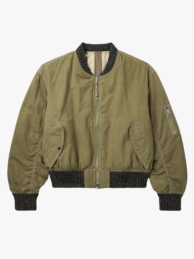 Image may contain: Clothing, Coat, Jacket, Knitwear, and Sweater