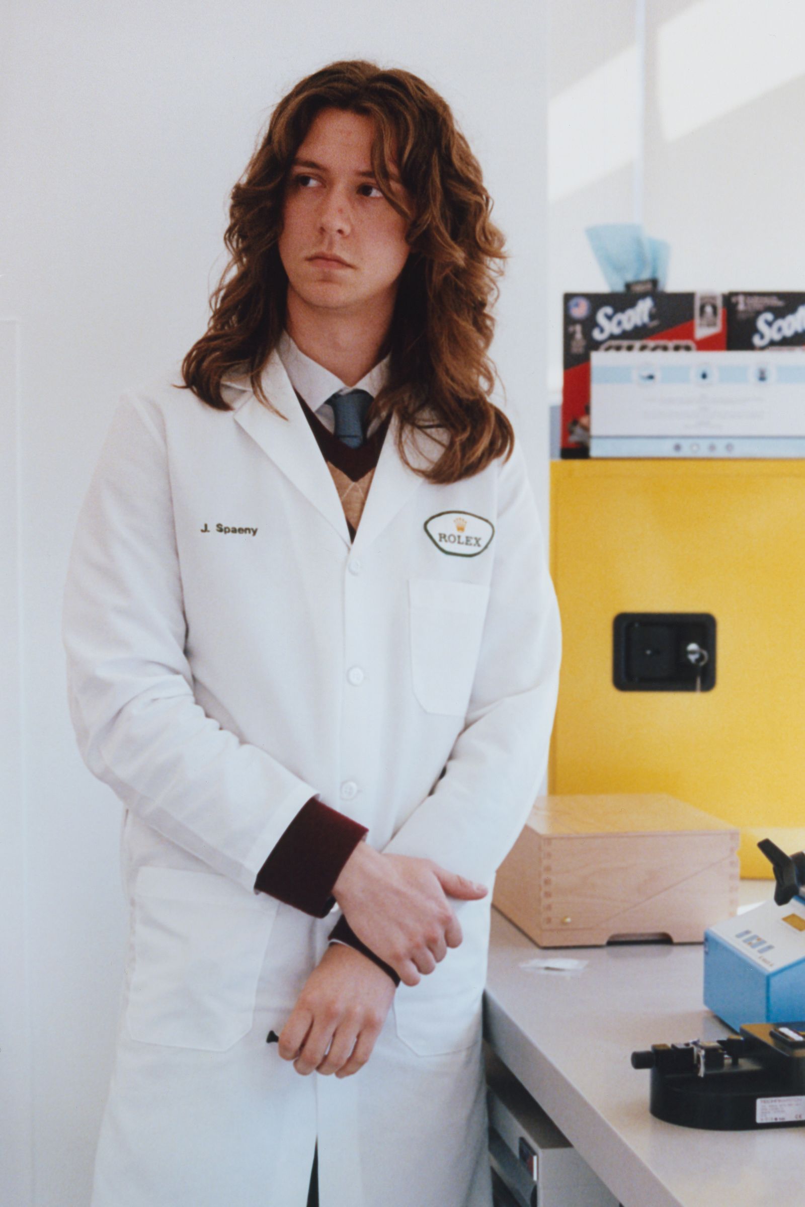 Image may contain Clothing Coat Lab Coat Adult Person Face and Head