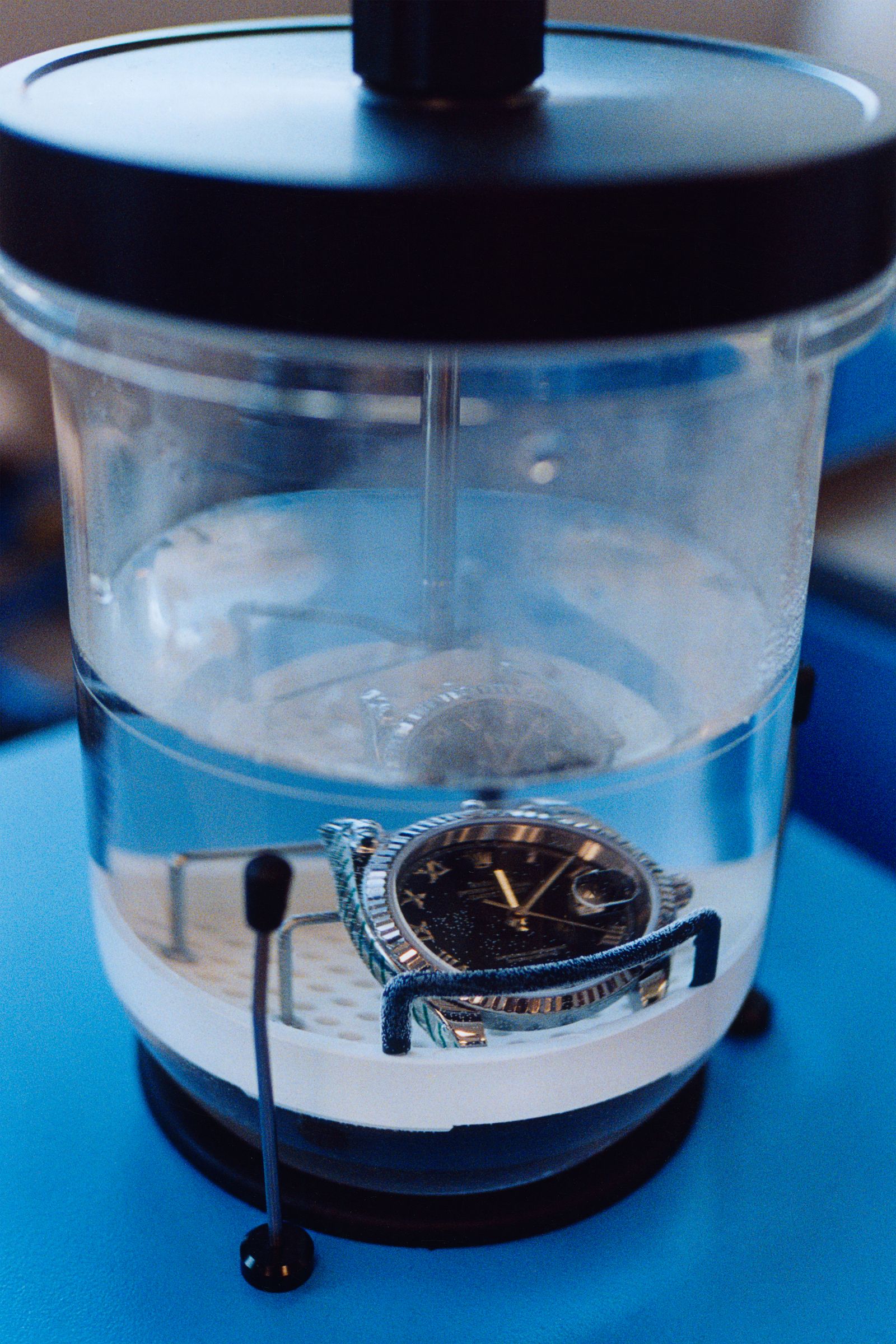 Image may contain Wristwatch Cup and Cooking