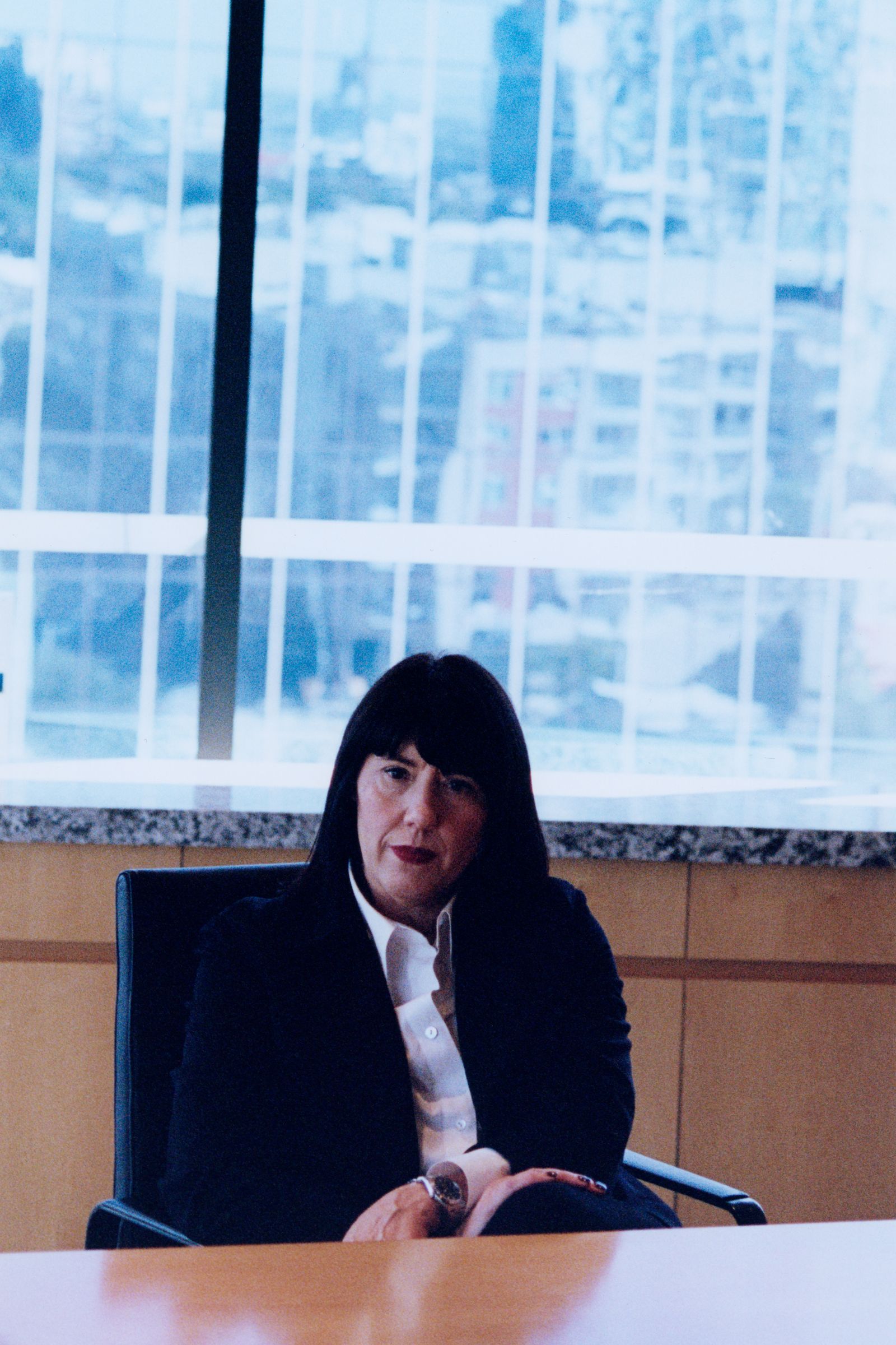 Image may contain Adult Person Executive Face Head Photography Portrait Blazer Clothing Coat and Jacket