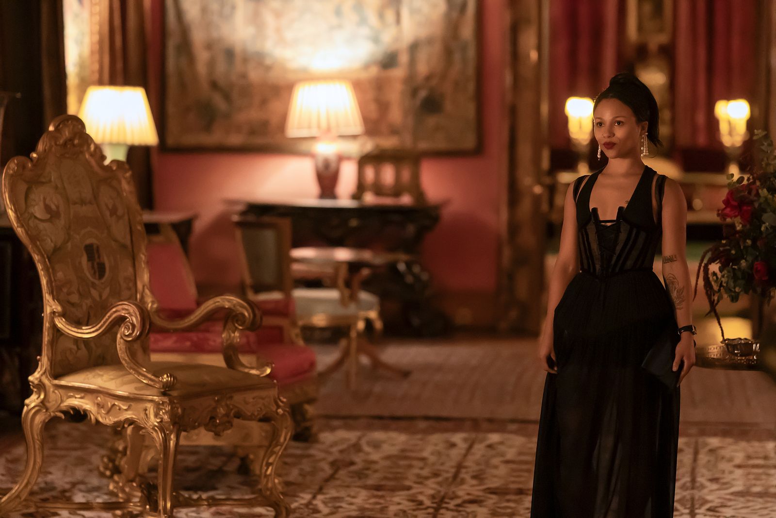 Image may contain Lamp Table Lamp Person Lighting and Adult