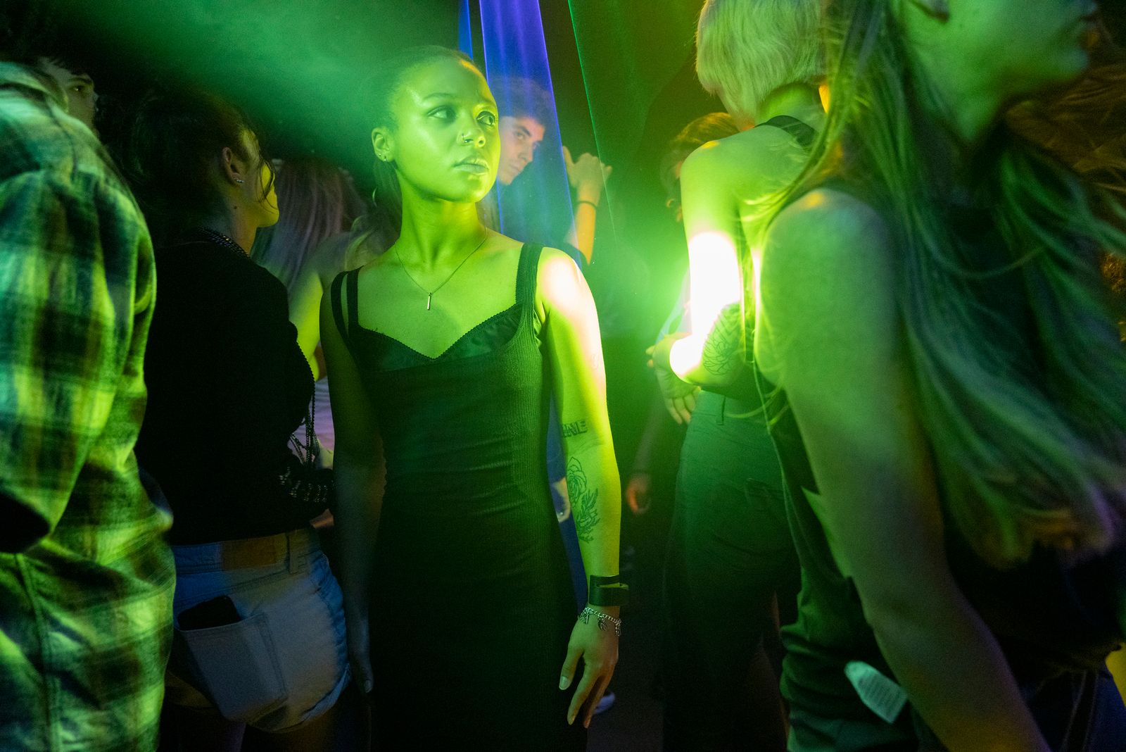 Image may contain Club Night Club Urban Adult Person Disco Face Head Accessories Jewelry and Necklace