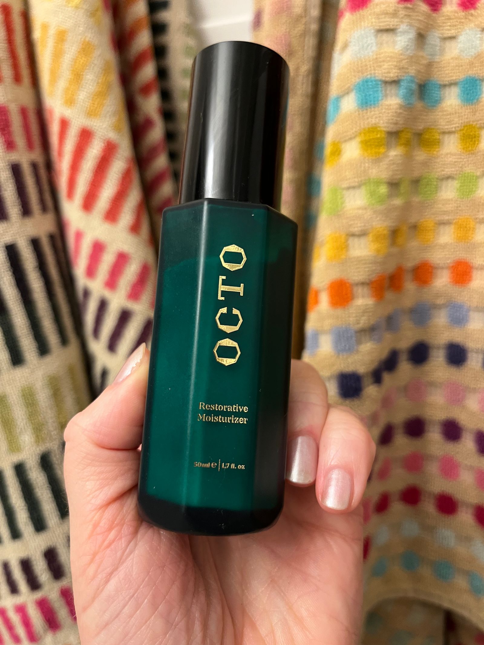 Image may contain Cosmetics Bottle Perfume and Nail Polish