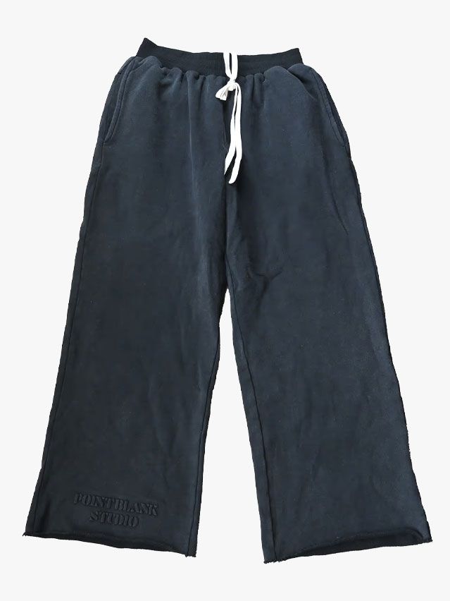 Image may contain: Clothing, Shorts, Pants, and Coat