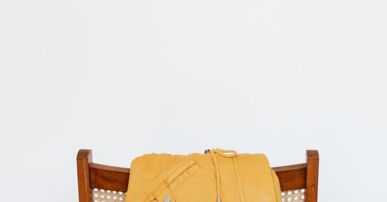 Parkas - Yellow parka on wooden chair