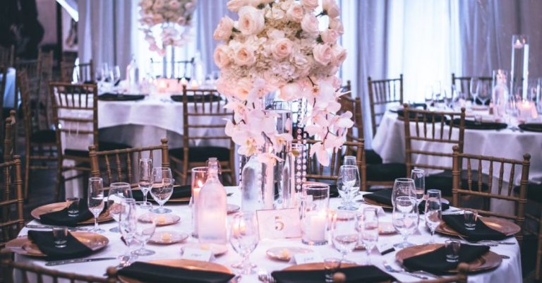 Weddings - Pink and White Roses Centerpiece on Top of Table