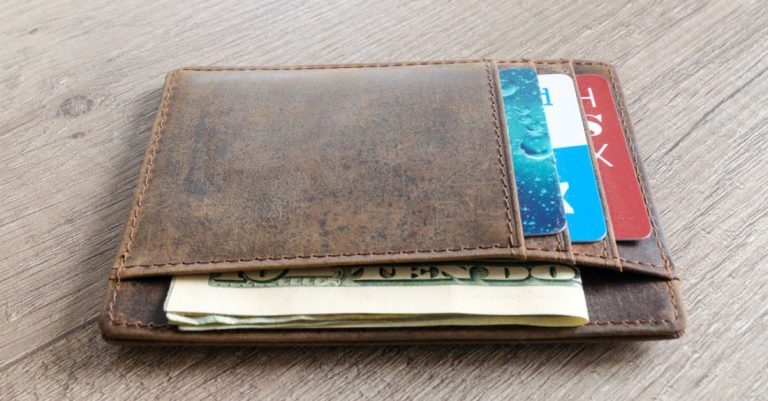 Wallet - Brown Leather Wallet and Us Dollar Banknote