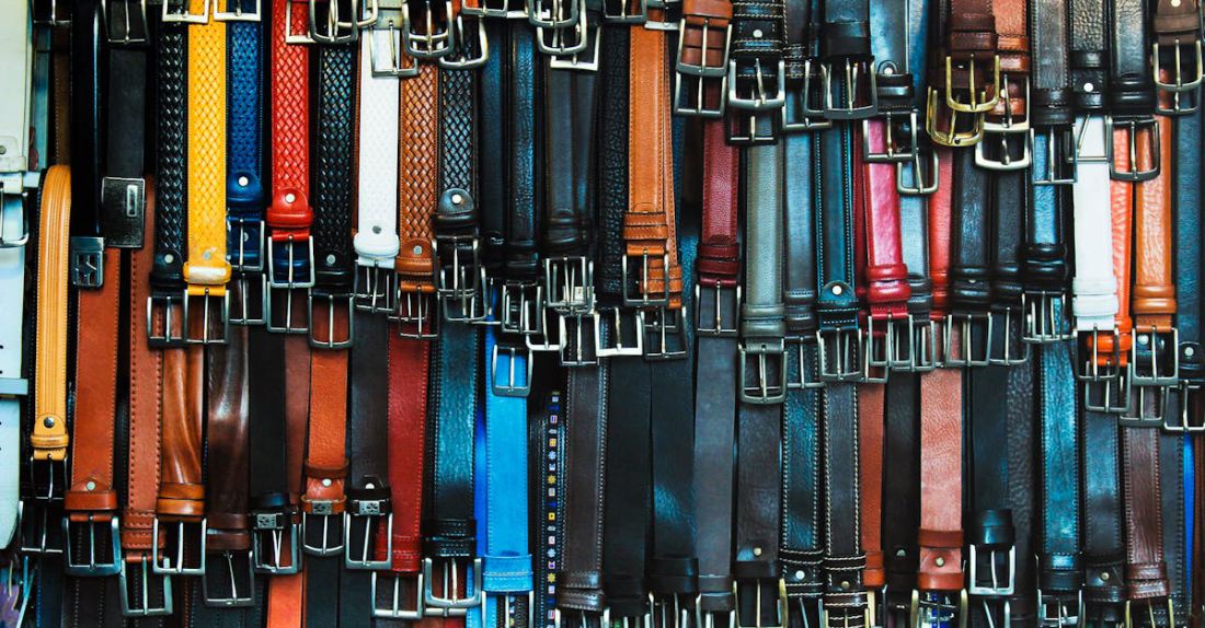 Belt - Shallow Focus Photography of Assorted-color Leather Belts