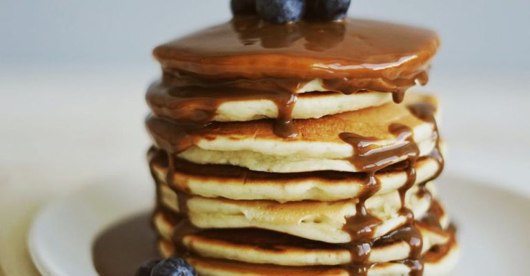Layers - Shallow Focus Photography of Pancakes With Blueberries and Syrup